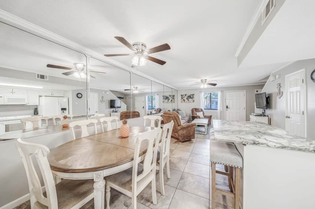 Seating for 6 at the dining table and 3 at the island