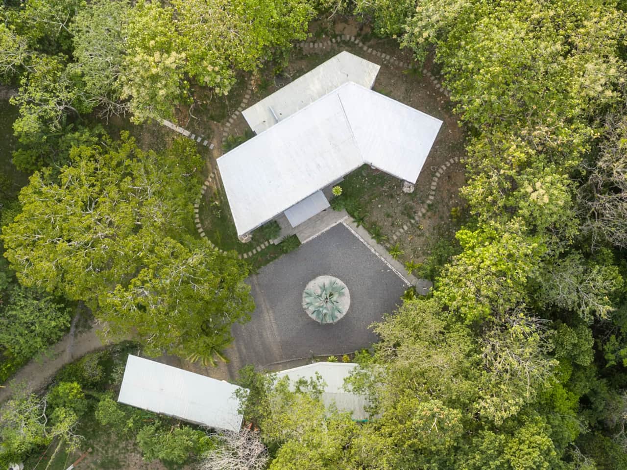 Aerial view of Casa Aloha surrounded by tropical forest near Montezuma