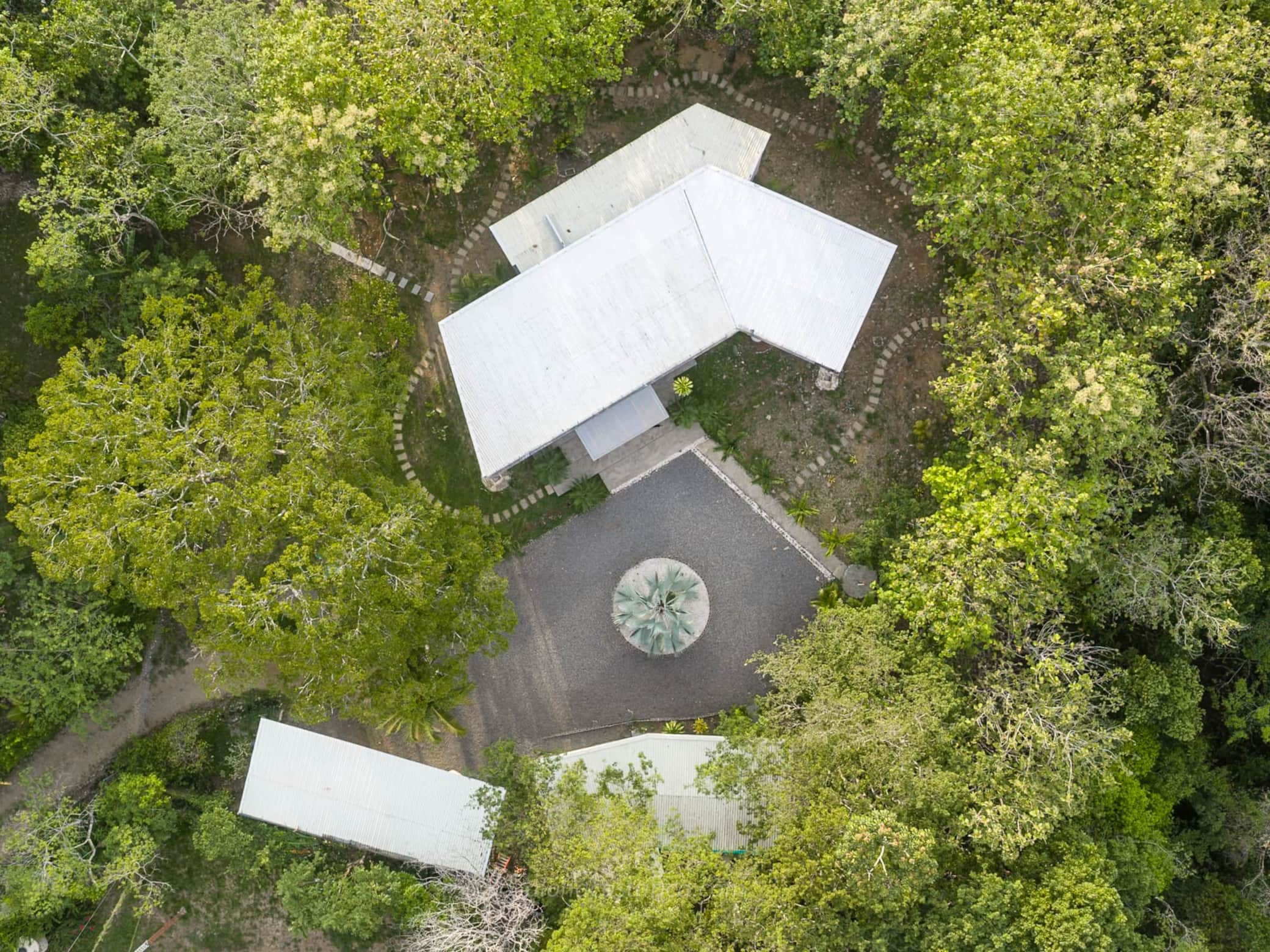 Aerial view of Casa Aloha surrounded by tropical forest near Montezuma