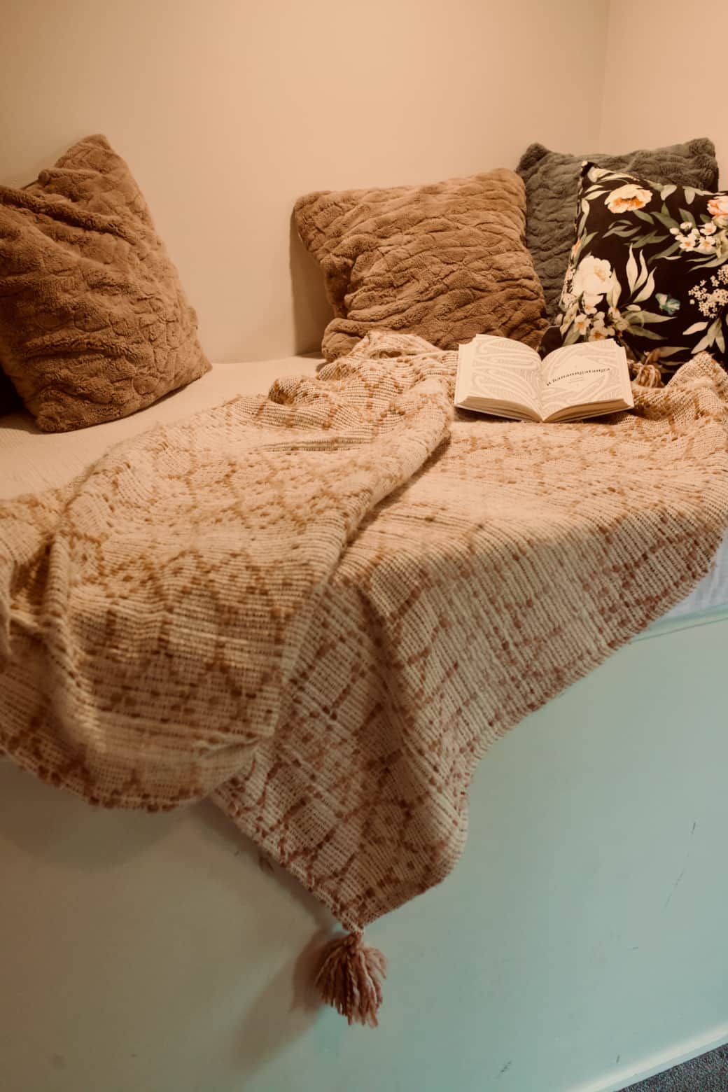 The reading nook under the stairs — a guest favourite