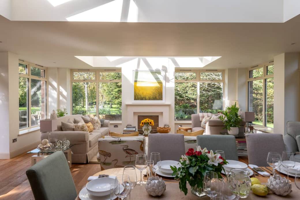 The Orangery, views to the gardens, dining table seating for 12 guests 