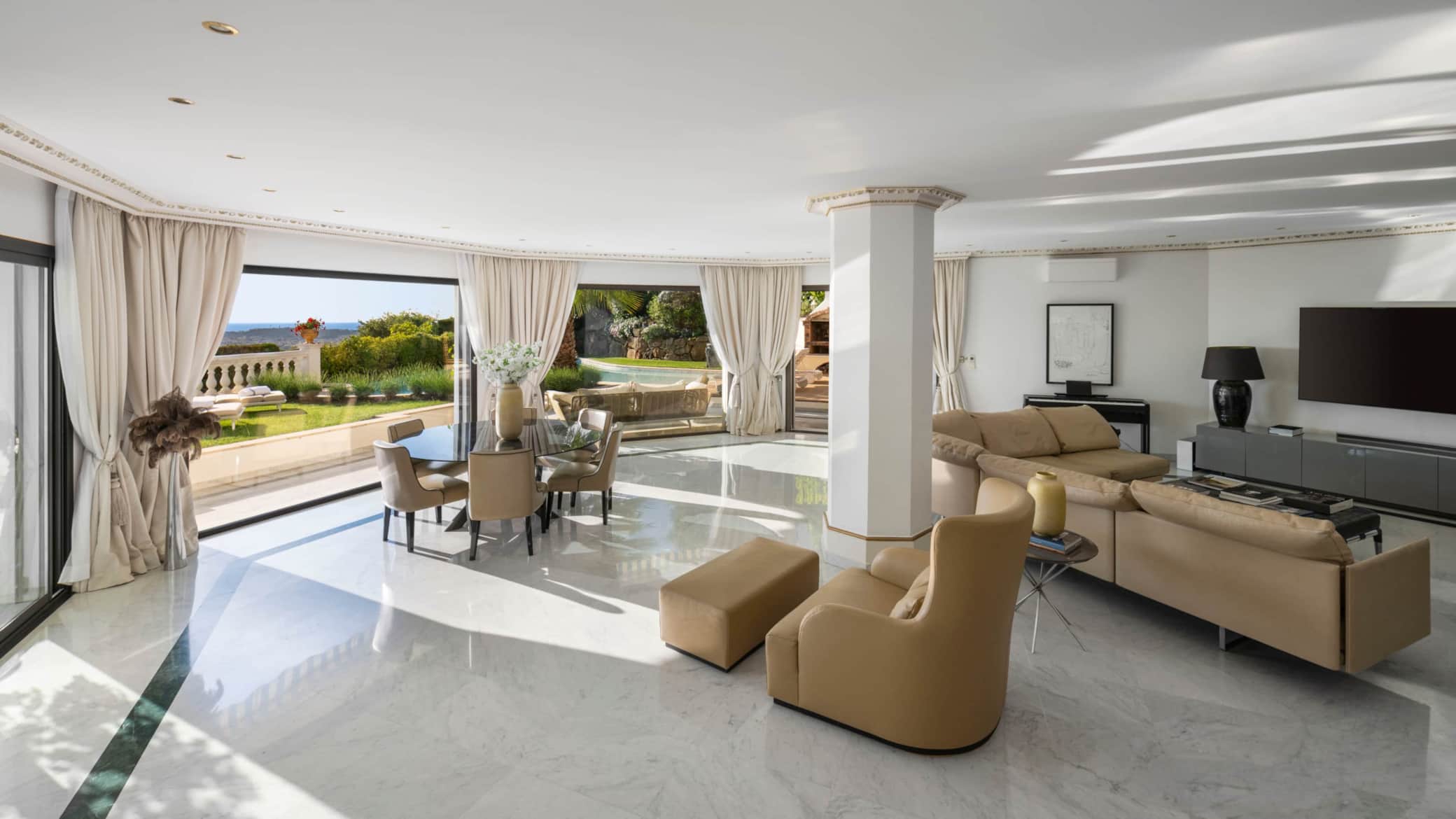 Main living room opening onto the pool terrace