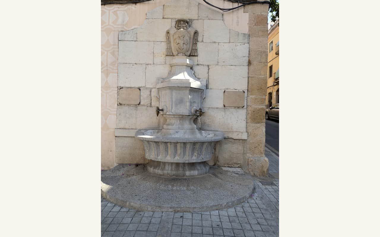 Stone fountain beside Plaça de Sant Antoni in Tarragona