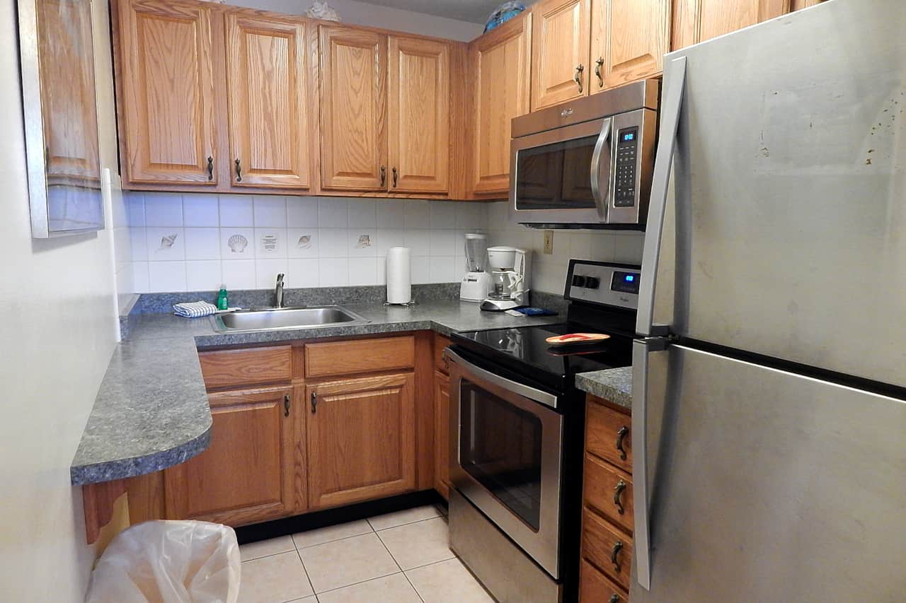 32 - Kitchen has full size appliances.