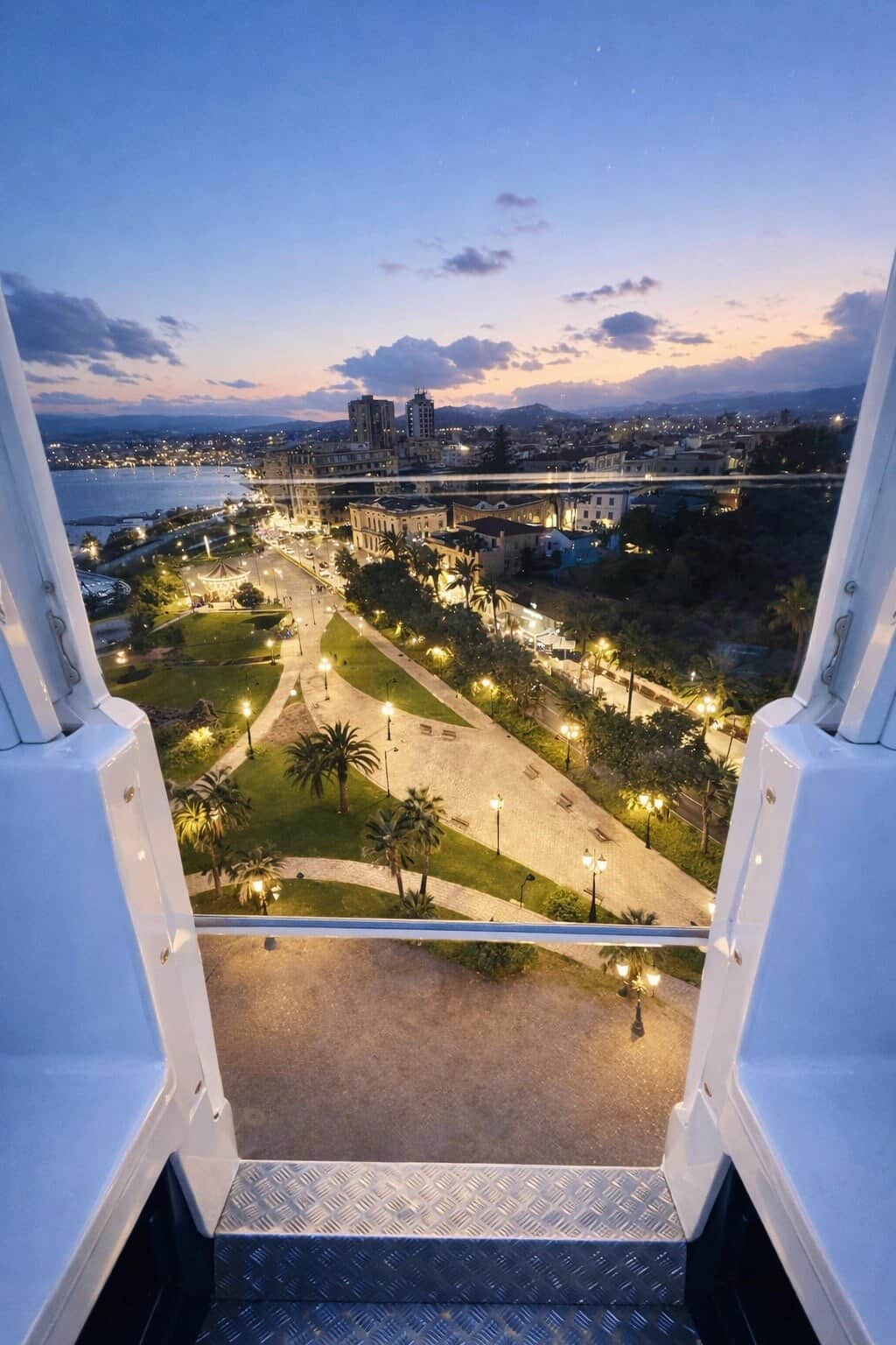 Olbia bus and train station with palm trees — the main transport hub for exploring North East Sardinia. Photo by RENTAL12.