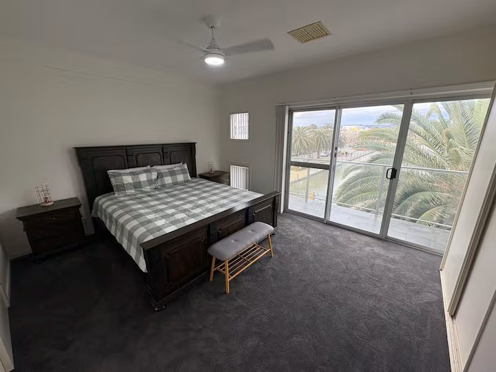 A very comfortable bed, with a view across the lake 