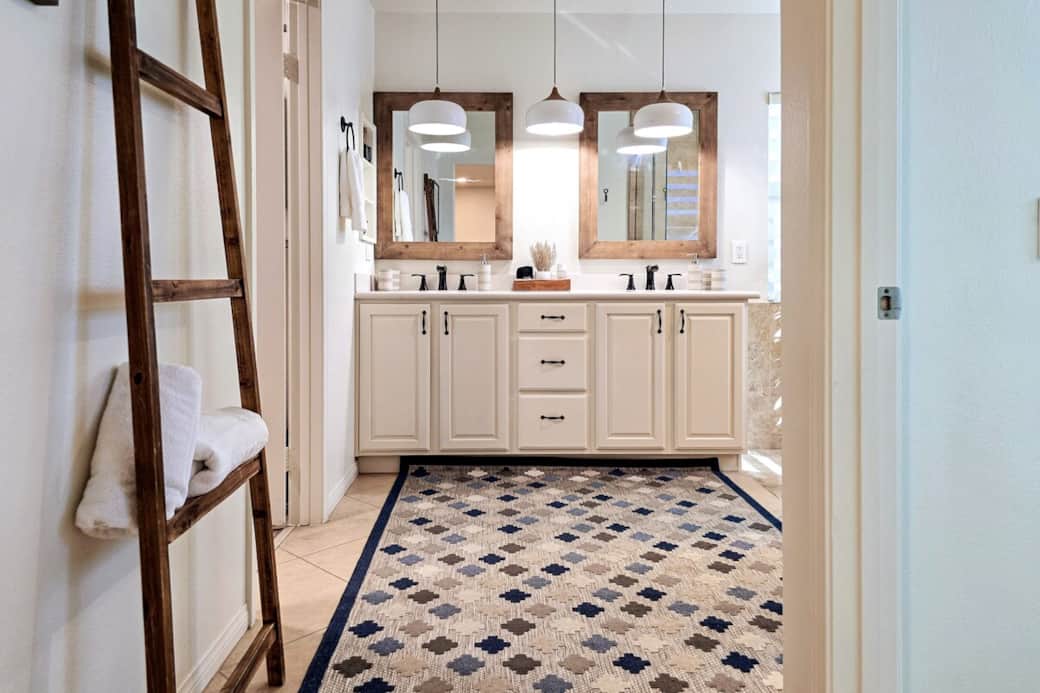 Ensuite bathroom #3 with double vanity and large walk-in closet.