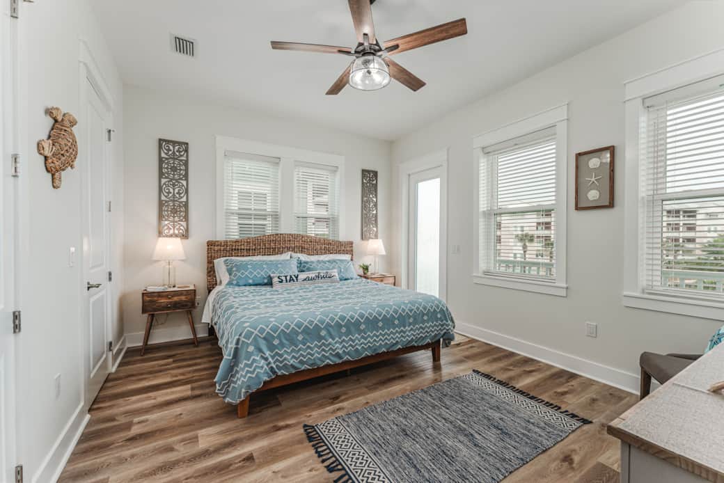 Master suite offers a king size bed with private balcony.