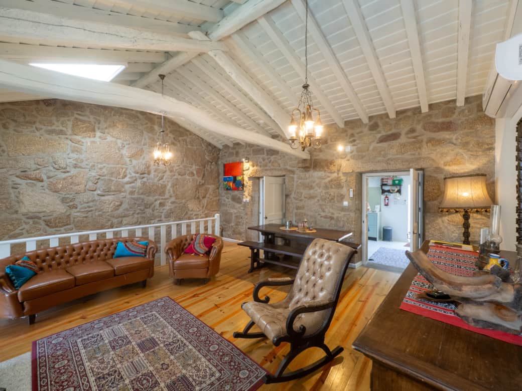 Unwind in the spacious living area where rustic charm meets modern comfort.