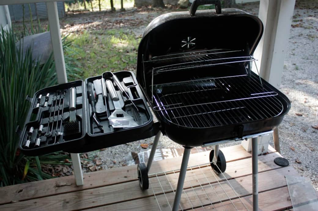 BBQ grill with accessories along with plenty of self lighting charcoal
