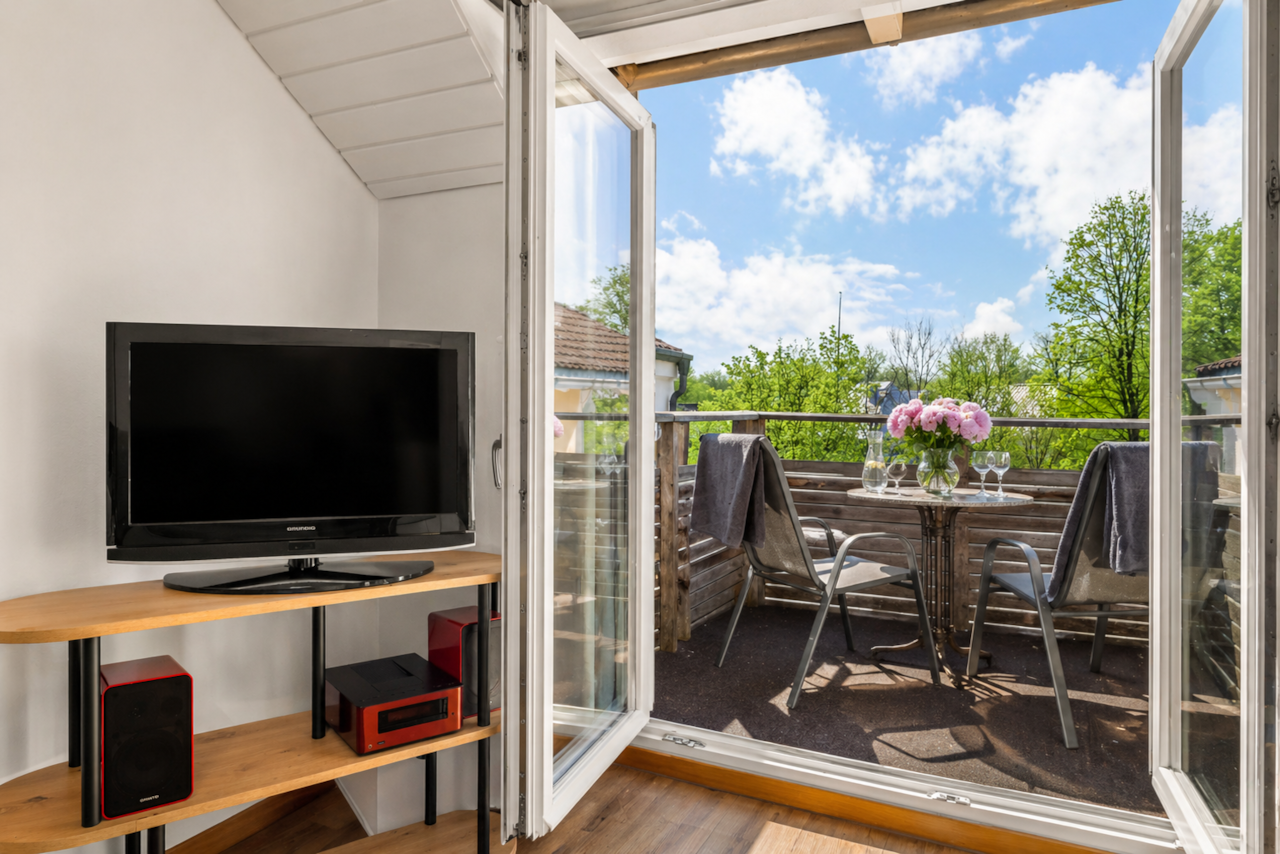 Wohnzimmer mit Balkon
