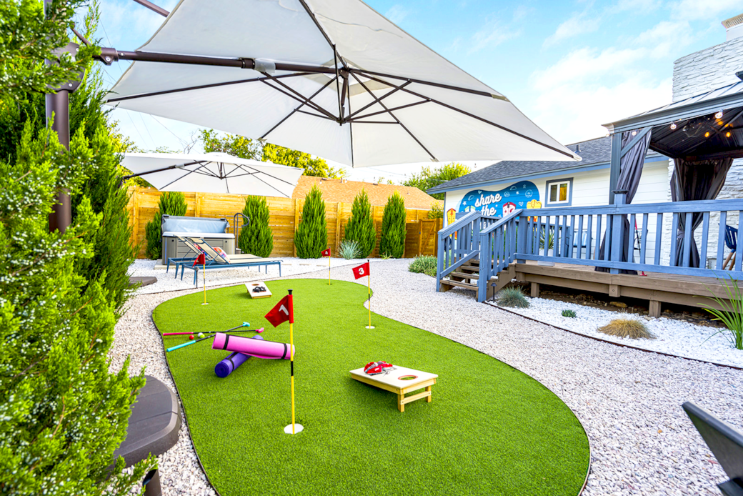 Backyard games + hot tub + BBQ deck Backyard games + hot tub + BBQ deck