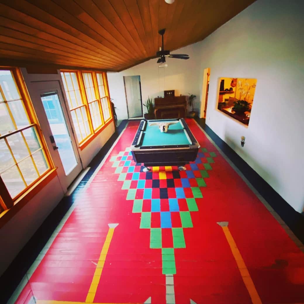 Pool Table & Piano Room Featuring Vintage Window Glass & Vintage Custom Floor Design Pool Table & Piano Room Featuring Vintage Window Glass & Vintage Custom Floor Design