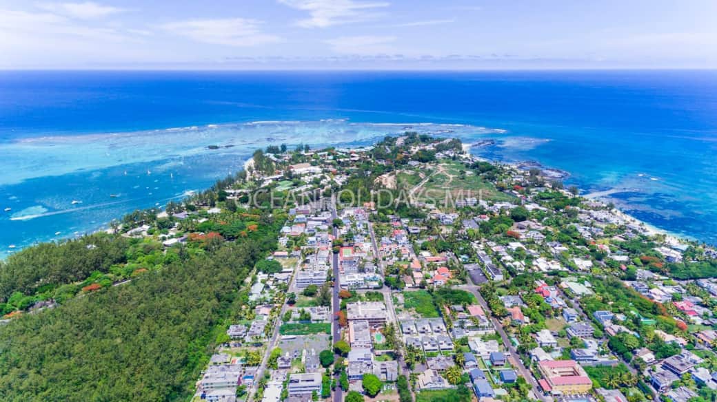 Aerial view of Pointe aux Canonniers area. Mon Choisy public beach is on the left of the photo