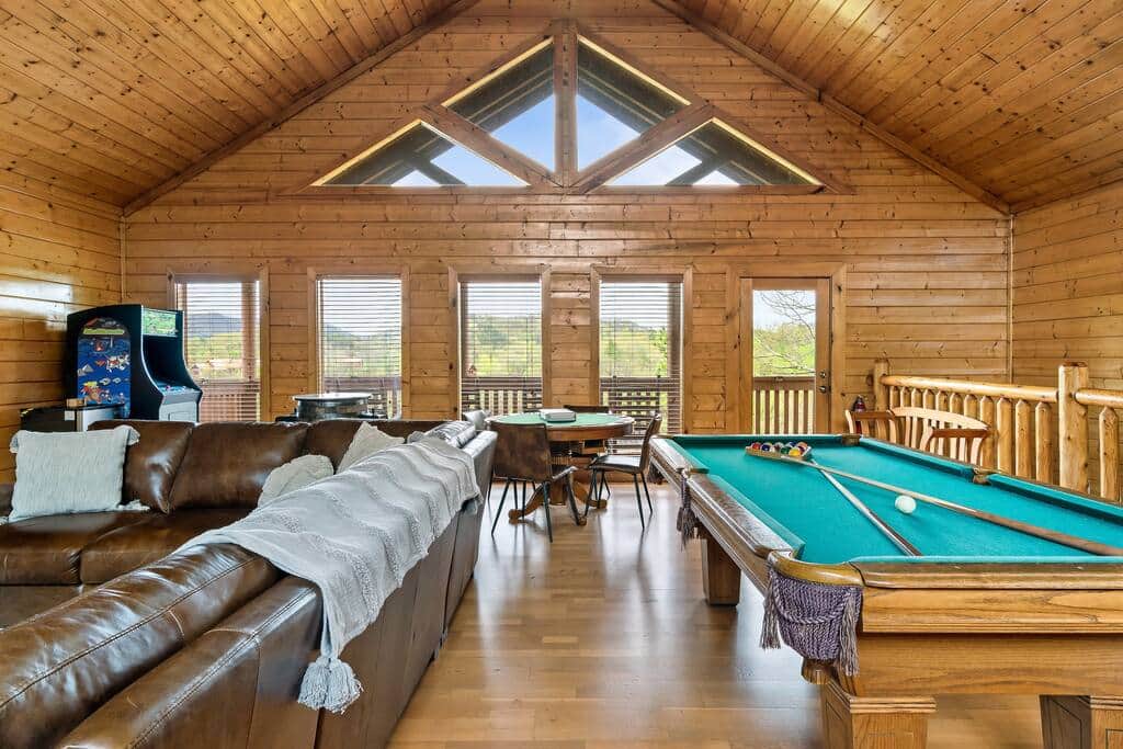 Large game room that also serves as the 4th bedroom and sleeps 4 people.