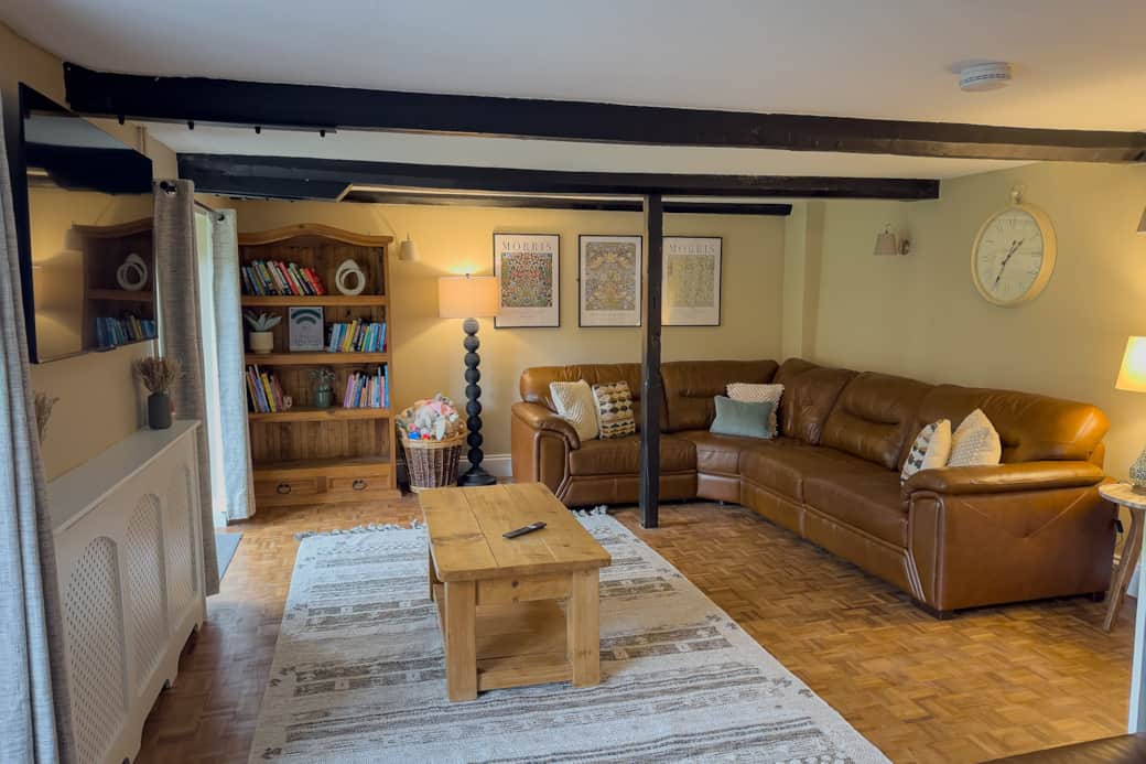 Our newly refurbished living area, with doors opening to the garden, Netflix, log burner, kids toys