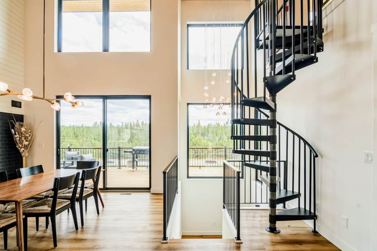 Grand entrance with beautiful chandelier, spiral staircase & amazing views!
