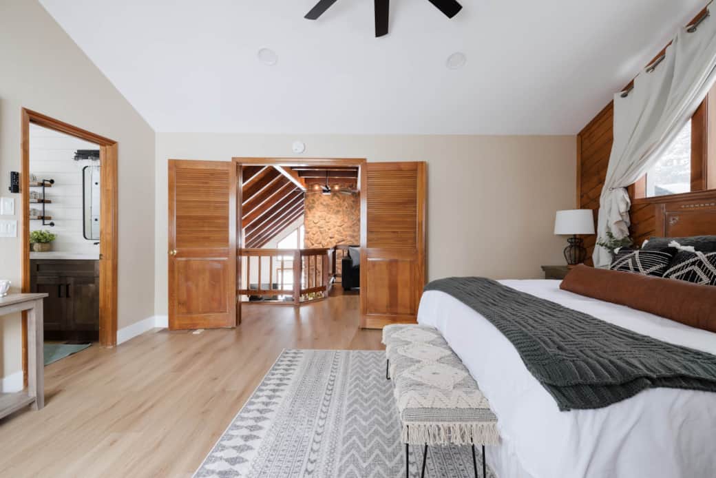 The master bedroom is connected to an upper loft.