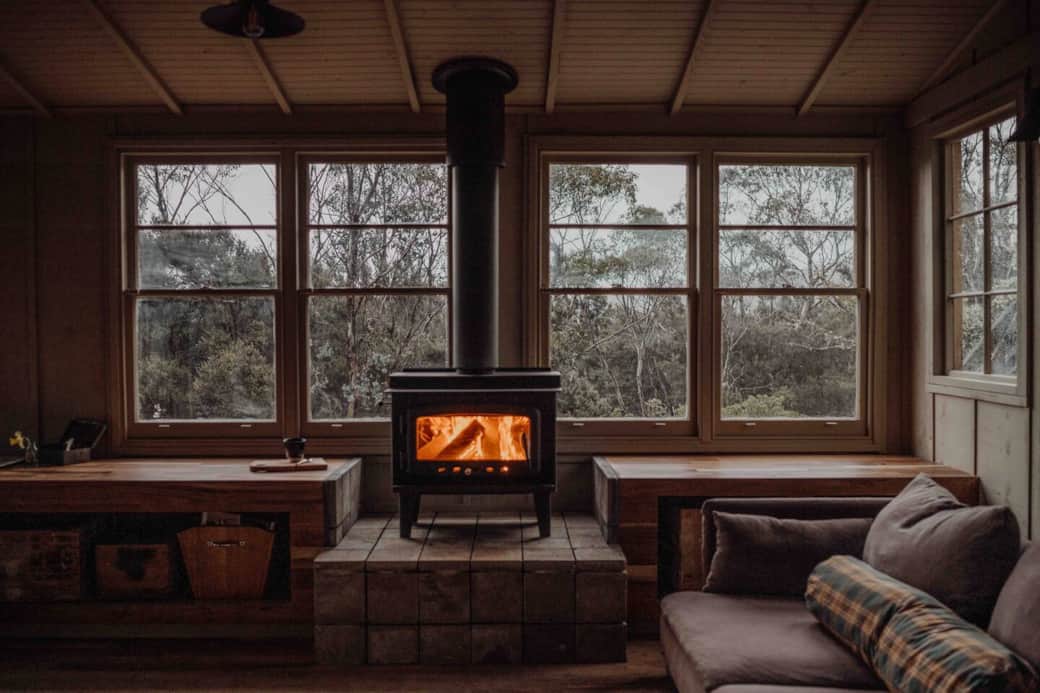 A Nectre wood fireplace warms in the space in any season.