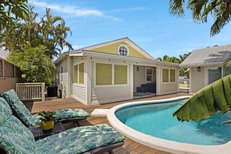 Back yard with pool and lounge area