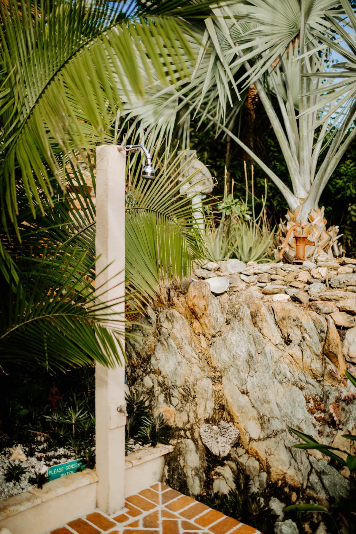 Enjoy tropical vibes from the outdoor rinse shower on the back deck