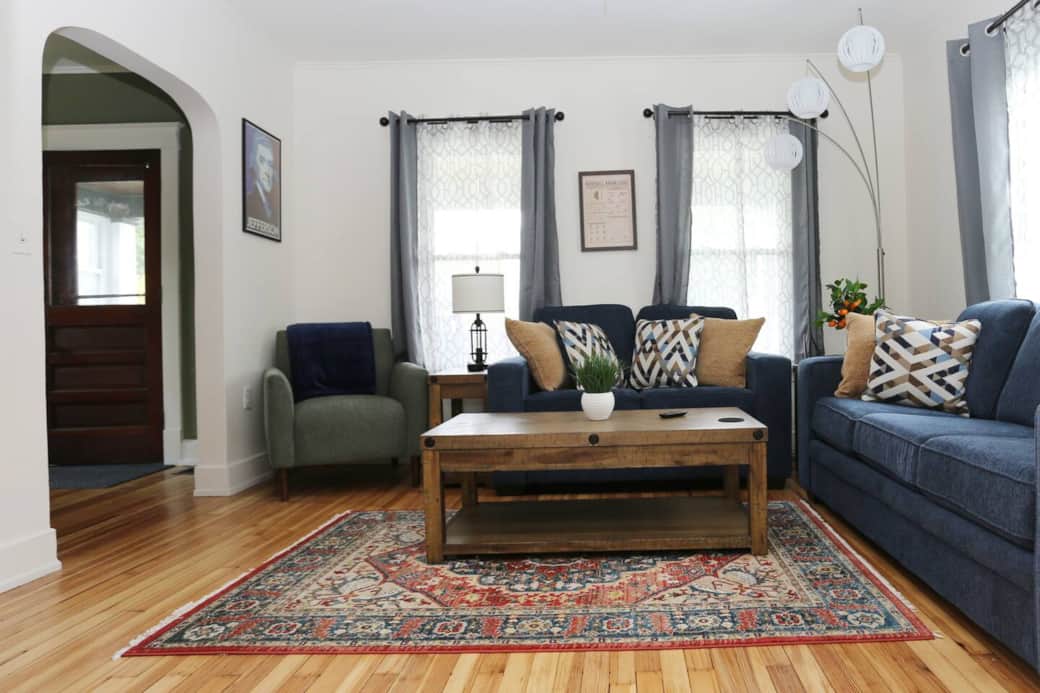 Spacious living room with 55" Smart TV, sleeper sofa for extra guests. Located on main floor.