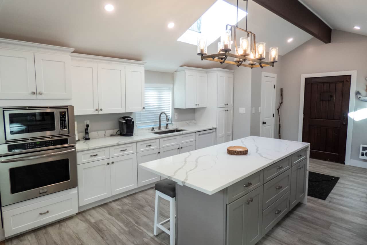 Chef's kitchen with wall oven and microwave