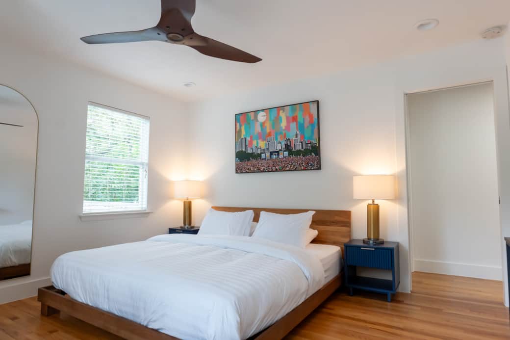 Unwind in style: king-sized comfort meets vibrant city energy in this chic retreat.