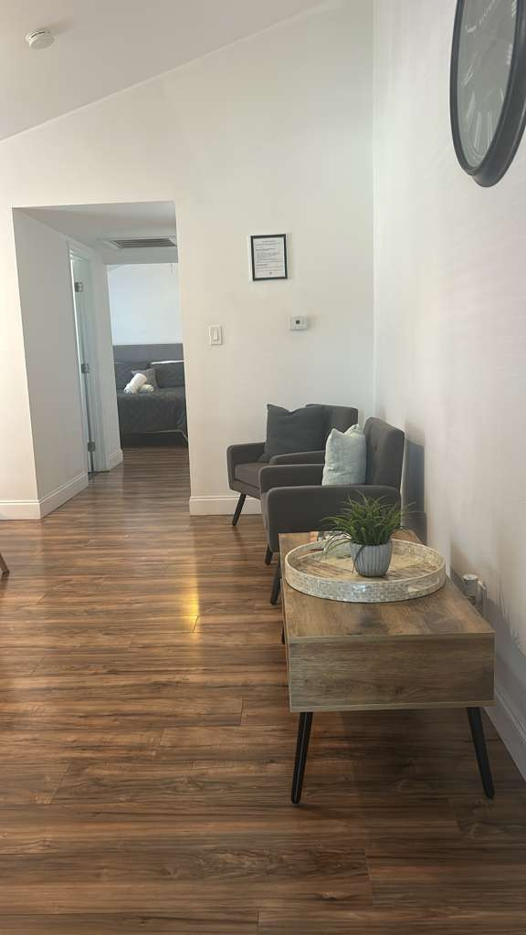 The studio features bright lighting for a warm and welcoming atmosphere. Lakeland, FL