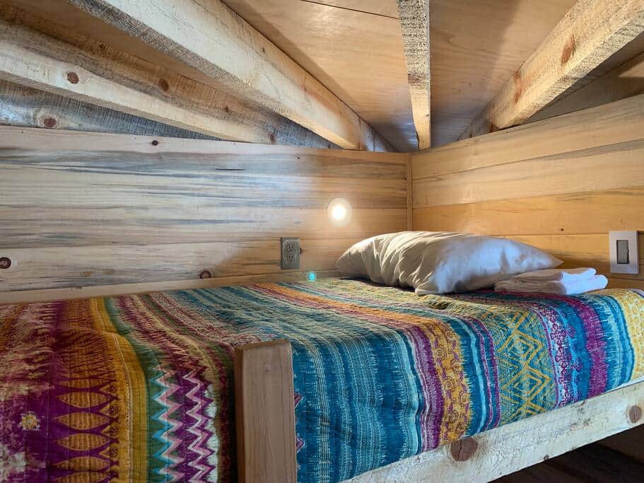 Each bunk has power and an adjustable reading light.