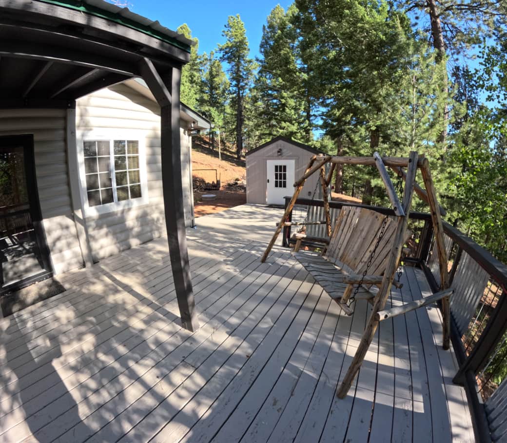 The deck looking at the front door and guest house