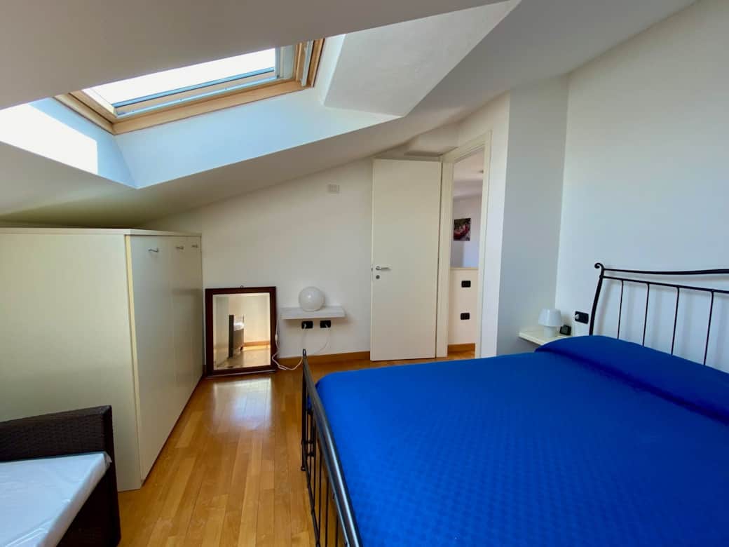 The master bedroom has a double bed.