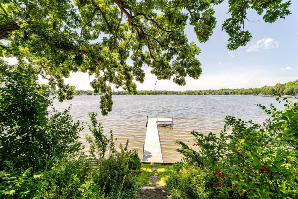 Summertime view from backyard to Bohner's lake. Yes, we offer a sandy bottom lakefloor with access to private pier. Summertime view from backyard to Bohner's lake. Yes, we offer a sandy bottom lakefloor with access to private pier.