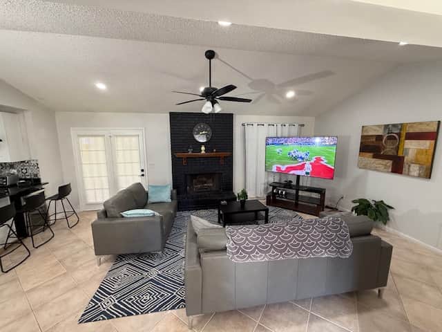 Have great conversation around the fireplace