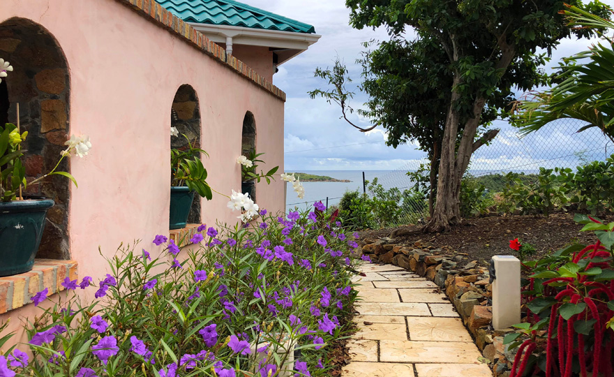 Pathway to the pool patio from the entrance gate