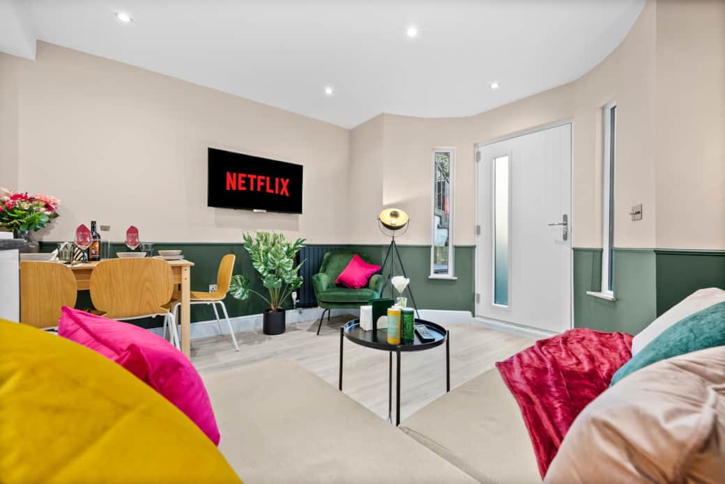 Living room with open plan kitchen and dining area