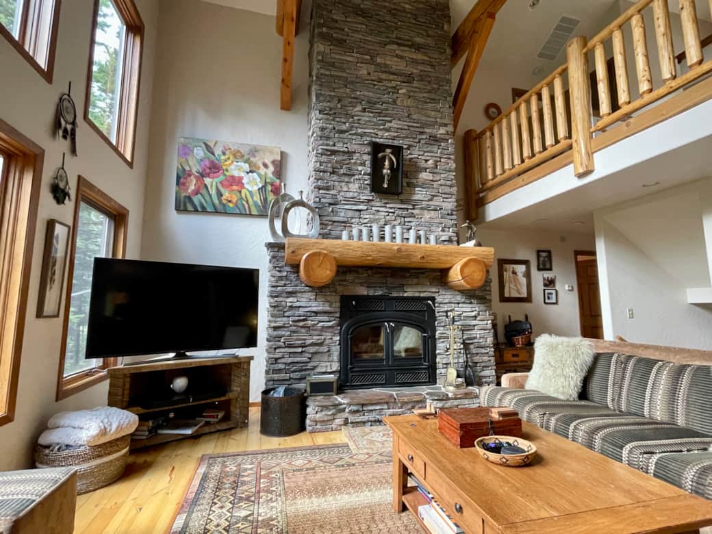 Living room with wood burning fireplace