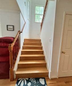 Stairs going up to landing then 8 more steps to bedroom level.