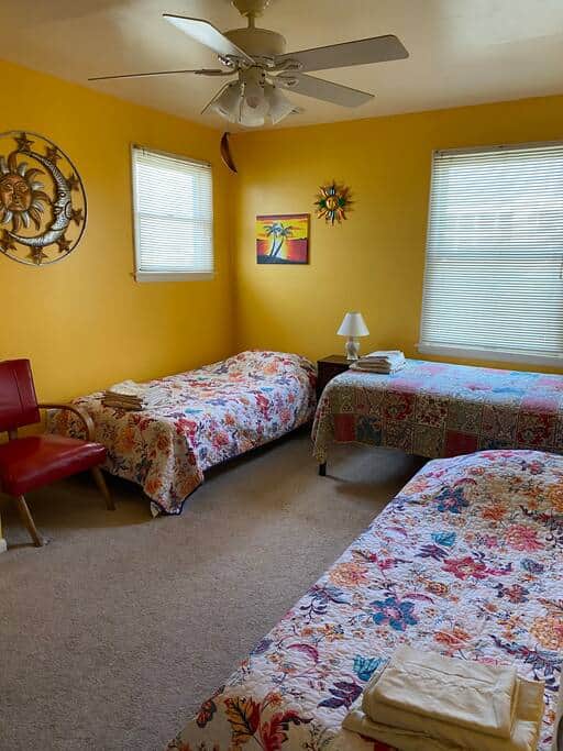 The Sunshine room is on the 2nd floor, has 3 twins, TV and blackout curtains.