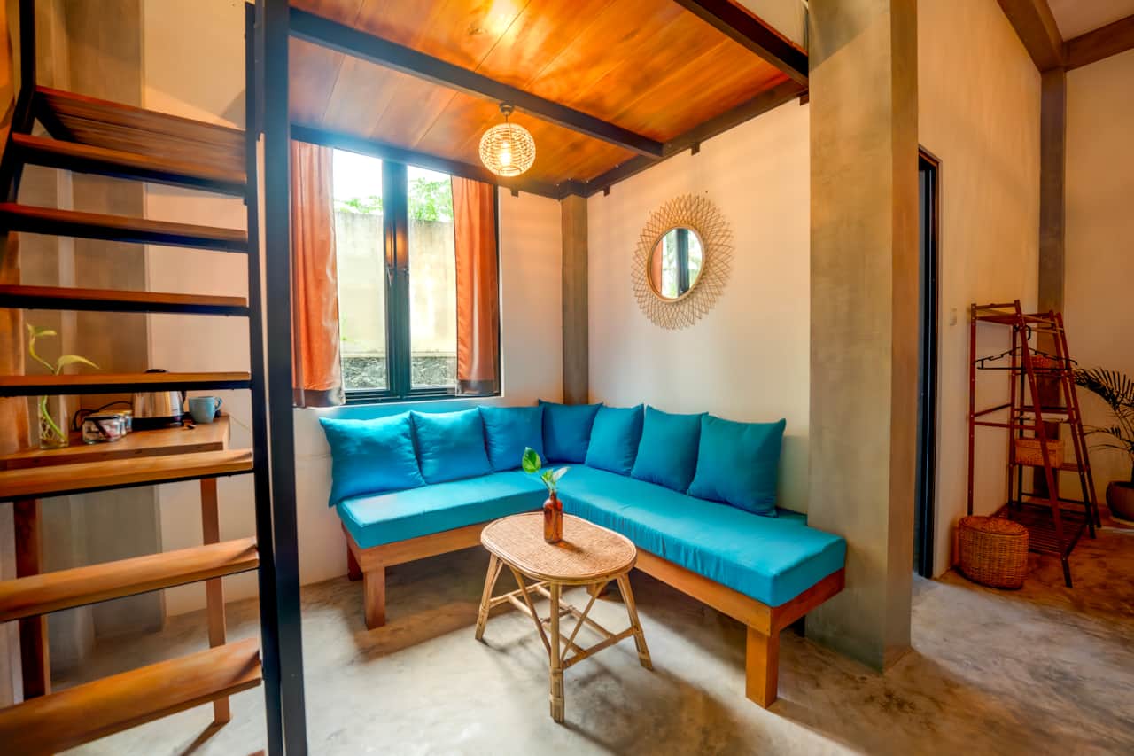 The sitting nook under the loft bed