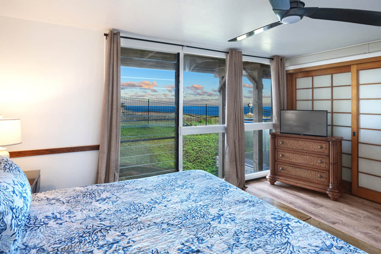 Wake up to beautiful ocean views from the bright and inviting primary bedroom.