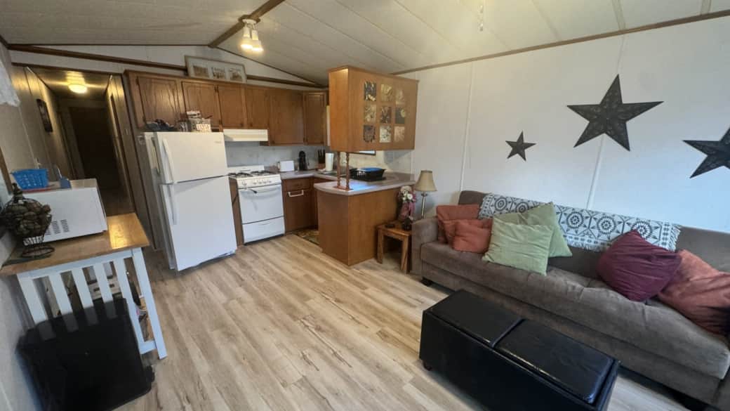 Living area and kitchen Living area and kitchen