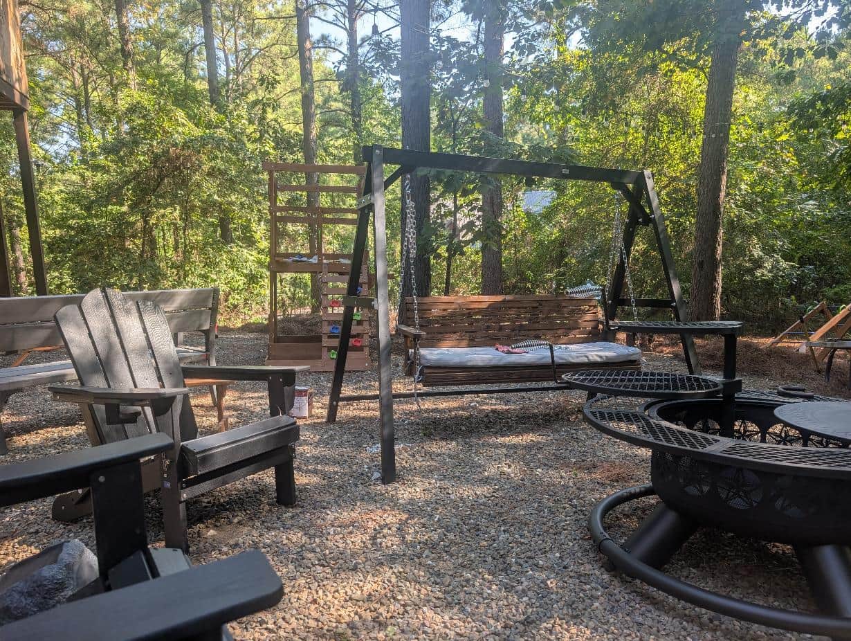Fire Pit Area with Swing & Adirondack Chairs