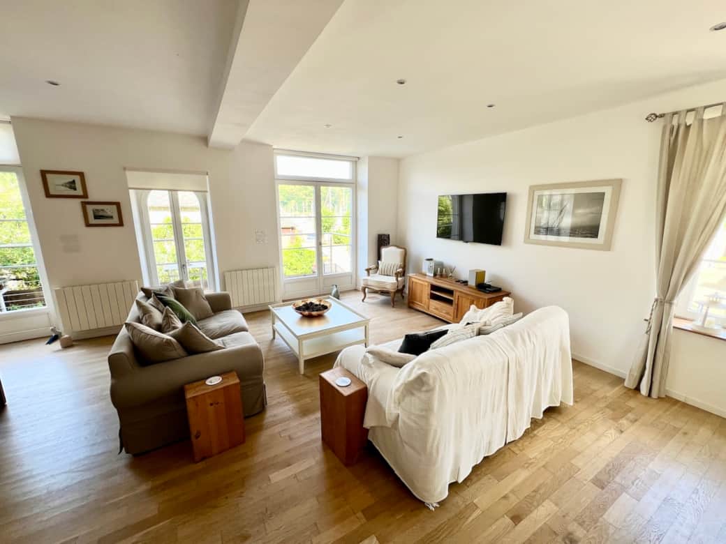 Bright and spacious living room with comfortable seating