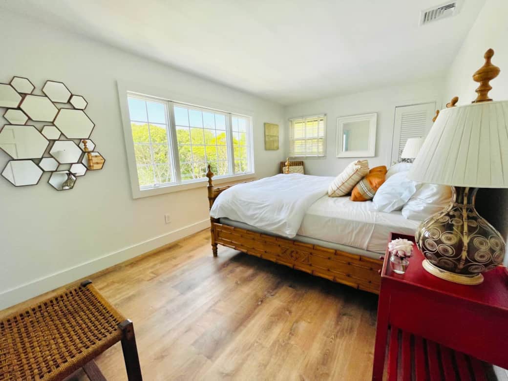 The Sunset suite's (BR2) king bed overlooks spectacular views of pool and golf course.