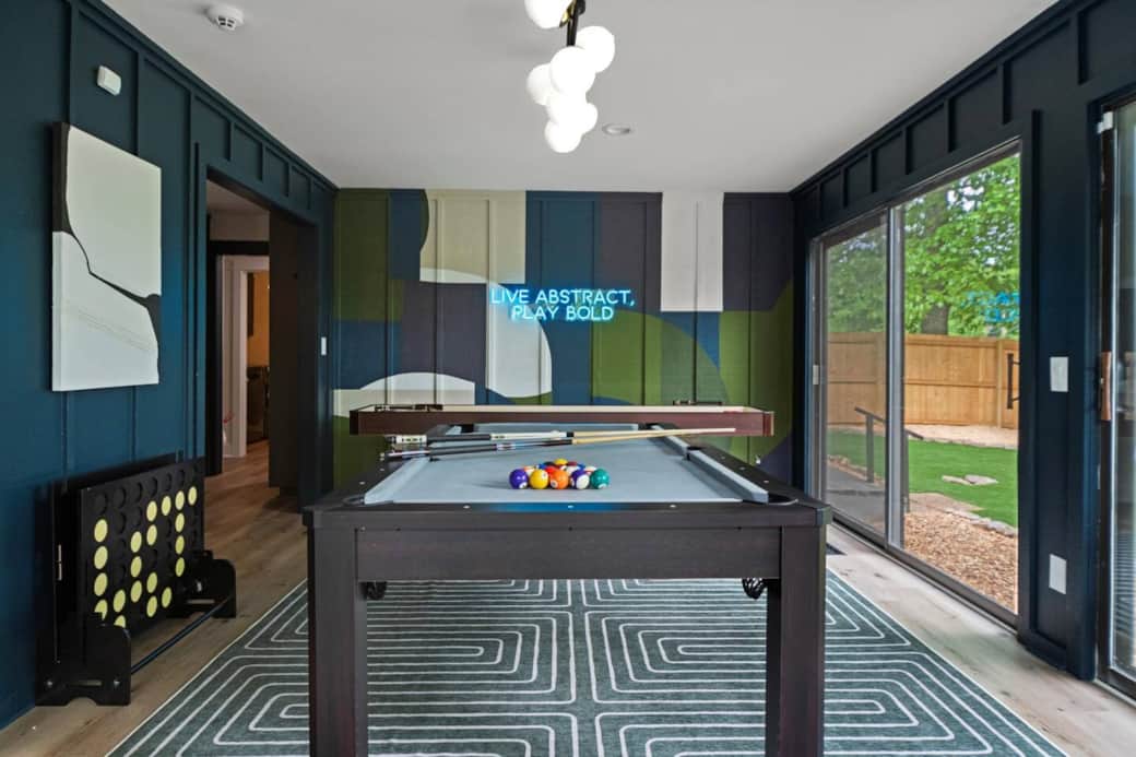 Bold and fun—Bluewood’s game room features pool, ping pong, shuffleboard, chess, cards & more.