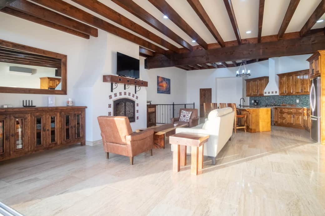 A beautiful blend of cooking, dining, and relaxation in this open concept living room and kitchen