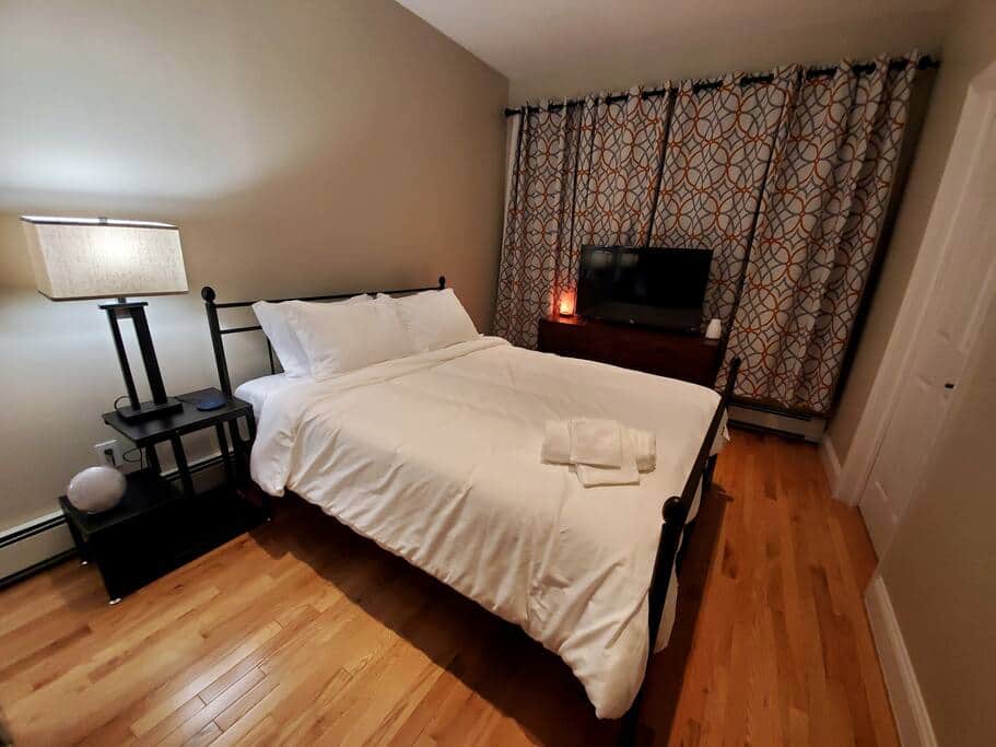 Bushwick monthly rental at The Junction — airy second bedroom with work-friendly setup and fast Wi-Fi