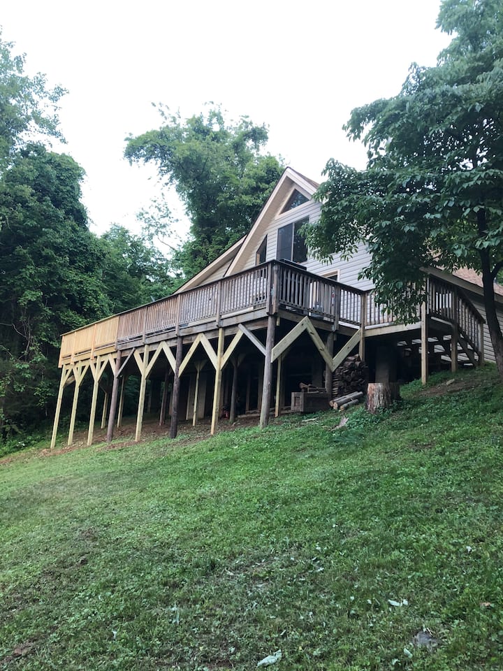 The huge deck is the place to savor the outdoors & create cherished memories. 