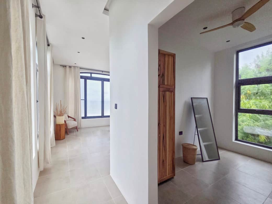 Bright master bedroom with ensuite bathroom and walk-in closet